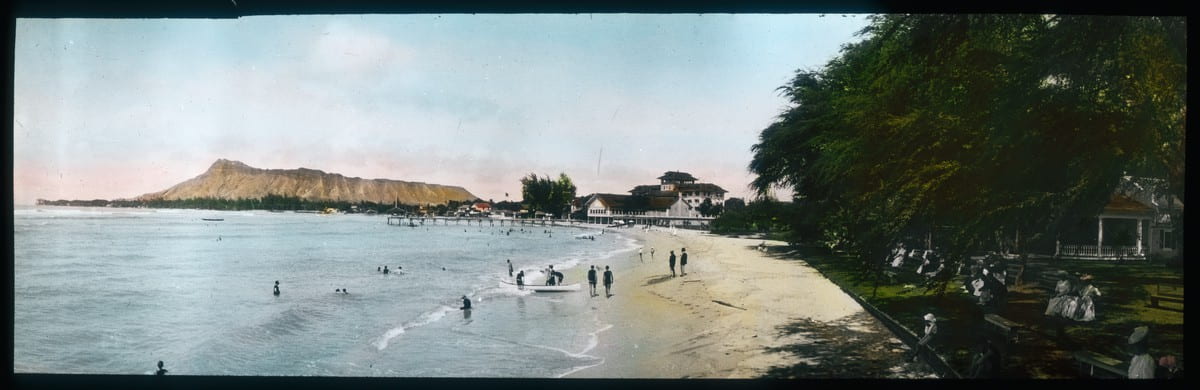Hand-colored photo of the ocean and beach